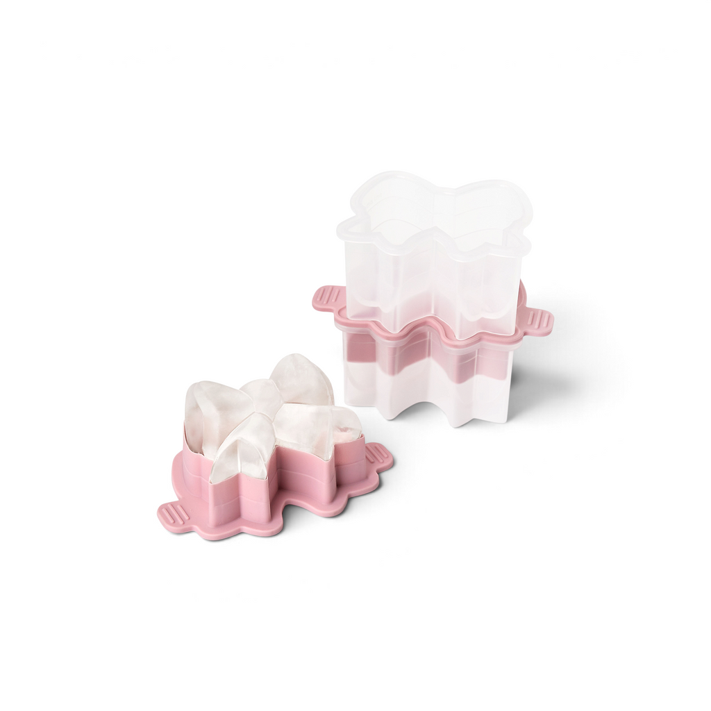The tovolo Fancy Bow Ice Molds (Set of 2) in pink and clear plastic are perfect for creating fun, bow-shaped ice for mealtime or pairing with matching cutters to elevate your lunch prep with coordinated, playful designs.