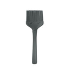 The Flex-Core Basting Brush is a black silicone brush with a rectangular bristle head and a tapered handle, shown on a white background.