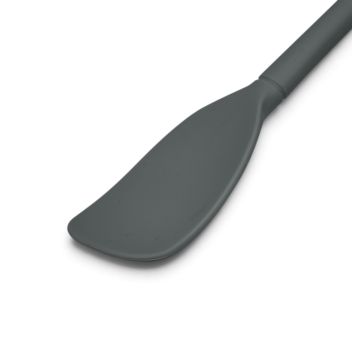 The Flex-Core Scoopula, a gray silicone spatula with a broad, flat blade and slightly curved edge, is shown on a white background.