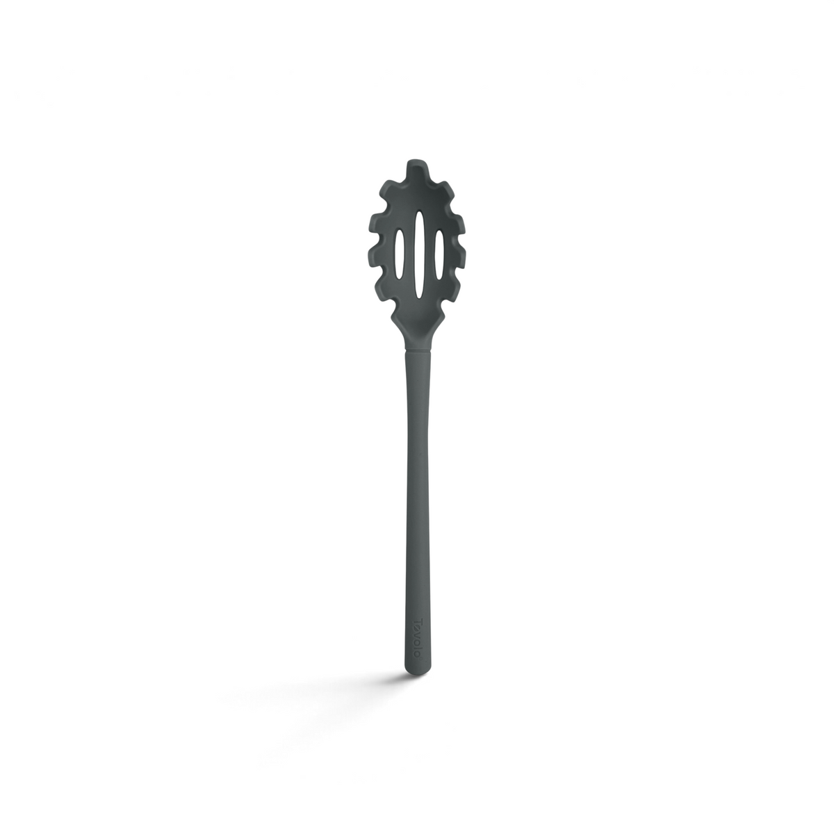 The tovolo Flex-Core Silicone Pasta Claw is a black spoon with a long handle, notched rounded edges, and two slots in the center for efficient draining.