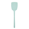 The tovolo Flex-Core Silicone Solid Turner features a light blue, rectangular, slightly curved head and a long handle, displayed against a white background.