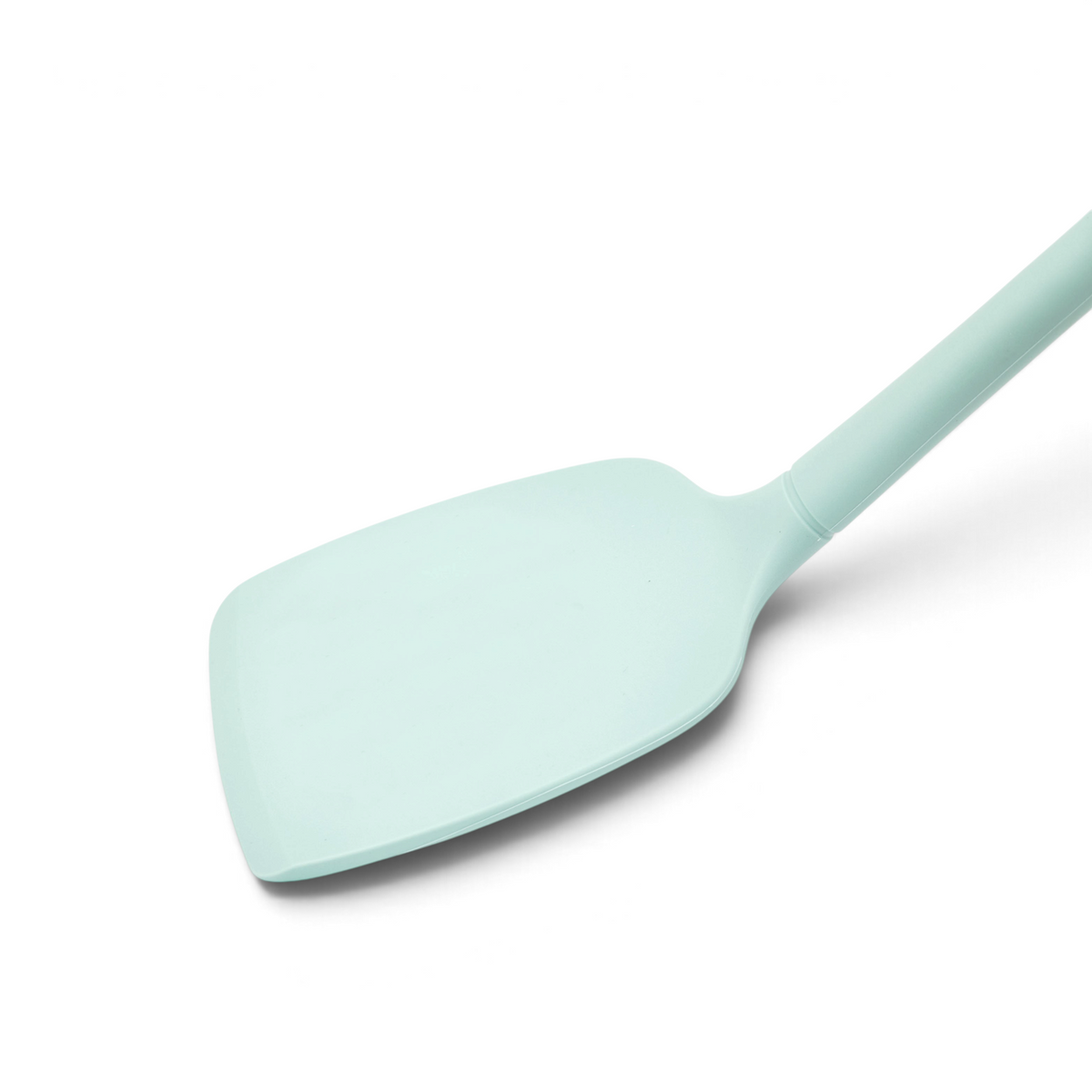 The tovolo Flex-Core Silicone Solid Turner features a light blue, flat, wide blade and a long handle, displayed against a white background.
