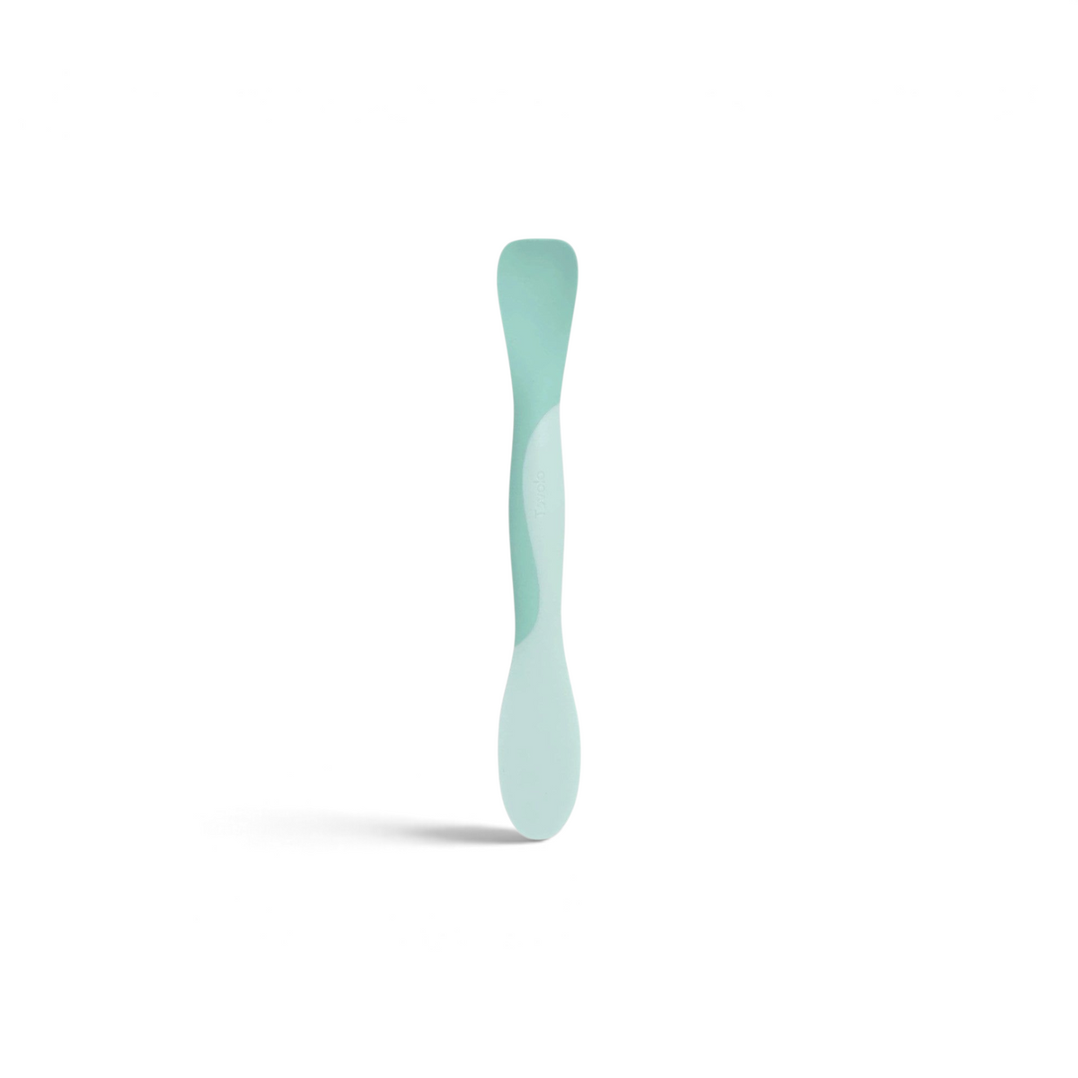 Tovolo Scoop and Spread kitchen tool in light green, featuring a dual-ended design for scooping, scraping, and stirring.