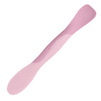 The Scoop and Spread is a double-ended silicone spatula in light and dark pink with rounded edges, shown on a white background—an essential tool for bakers.