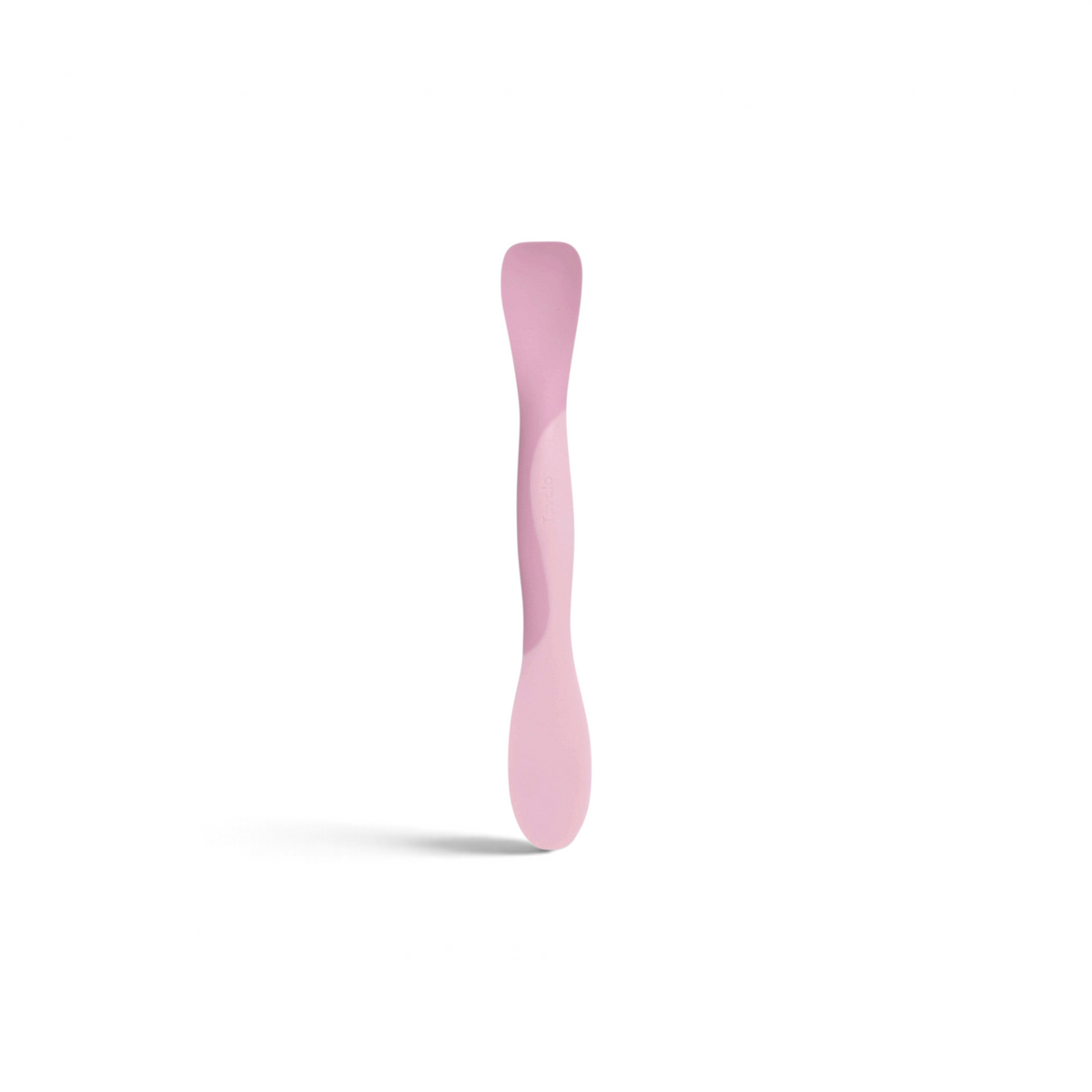 Tovolo pink Scoop and Spread kitchen tool for scraping, stirring, and spreading ingredients in a food processor.