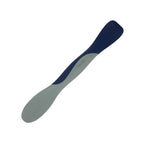 The Scoop and Spread is a dual-ended kitchen tool with blue and gray ends and a curved design for scooping and spreading; “Tovolo” is printed on the handle, making it a baker’s best friend.