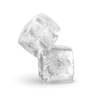 Two crystal-clear, slow-melting ice cubes—made with Ice Molds—are stacked at an angle against a white background, with visible air bubbles inside.