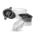 The tovolo Basketball Sports Ice Molds (Set of 2) are shown with a clear plastic container and a large, basketball-shaped ice cube in front—ideal for fans who want to keep drinks colder and add fun to their beverages.