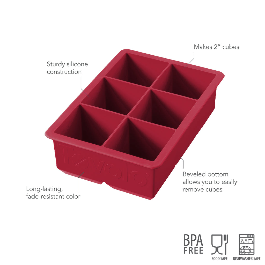 The tovolo King Cube Silicone Ice Mold has six red, 2-inch compartments, sturdy silicone build, beveled bottoms for easy release, and retains color. It’s BPA free, food safe, dishwasher safe—perfect for extra-large ice cubes.