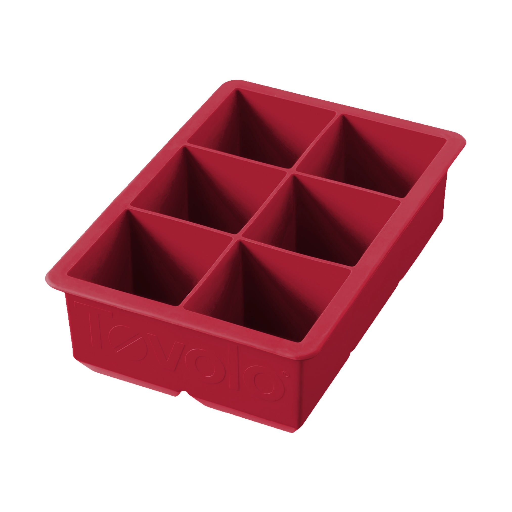 The tovolo King Cube Silicone Ice Mold features six large rectangular compartments, ideal for making extra-large ice cubes for cocktails and drinks.