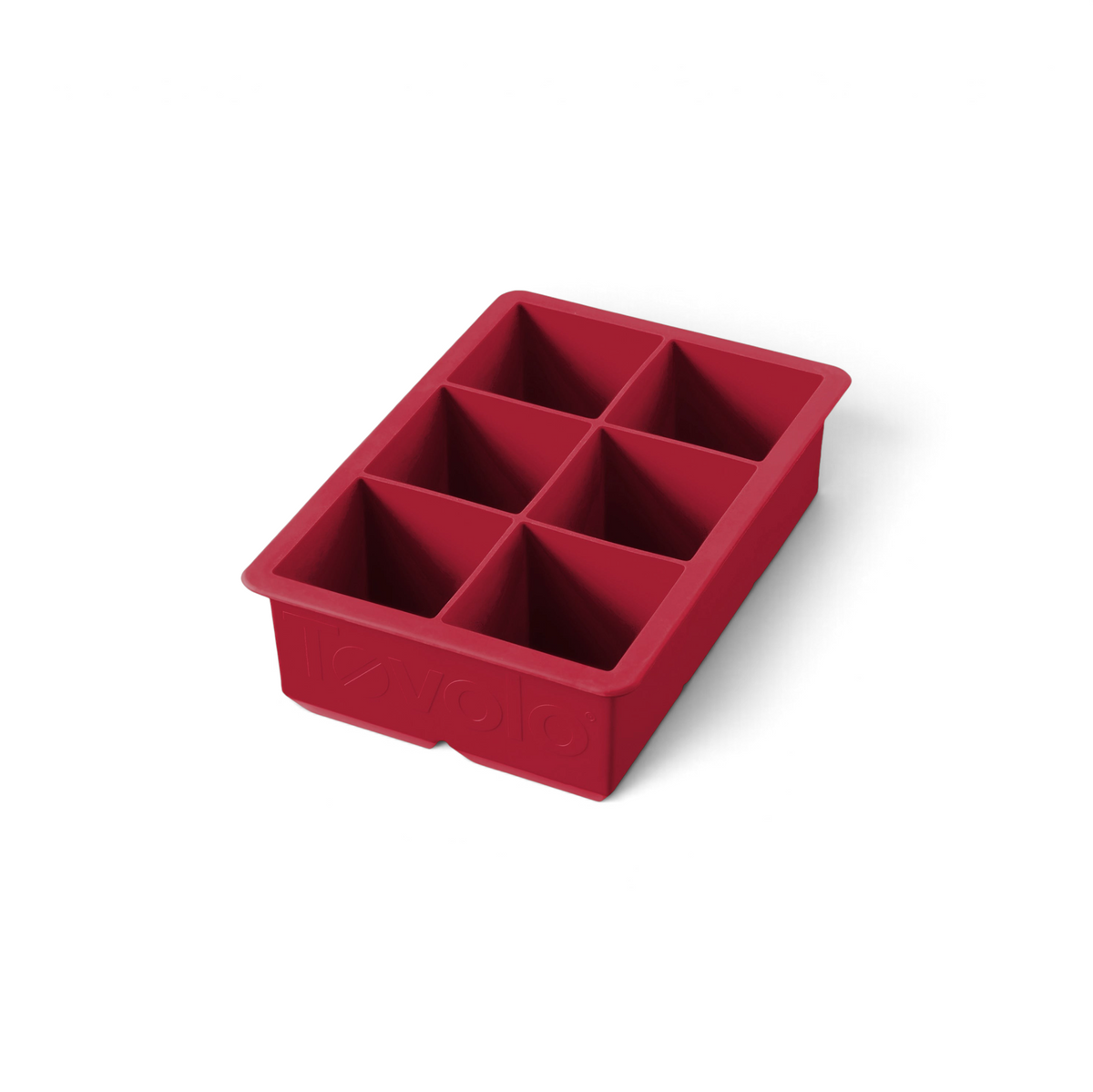 The tovolo King Cube Silicone Ice Mold features six large rectangular compartments, ideal for making extra-large ice cubes for cocktails and drinks.