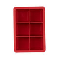 The tovolo King Cube Silicone Ice Mold is a red tray with six square compartments (two columns by three rows), ideal for craft ice, shown on a white background.