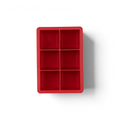 The tovolo King Cube Silicone Ice Mold is a red tray with six square compartments (two columns by three rows), ideal for craft ice, shown on a white background.
