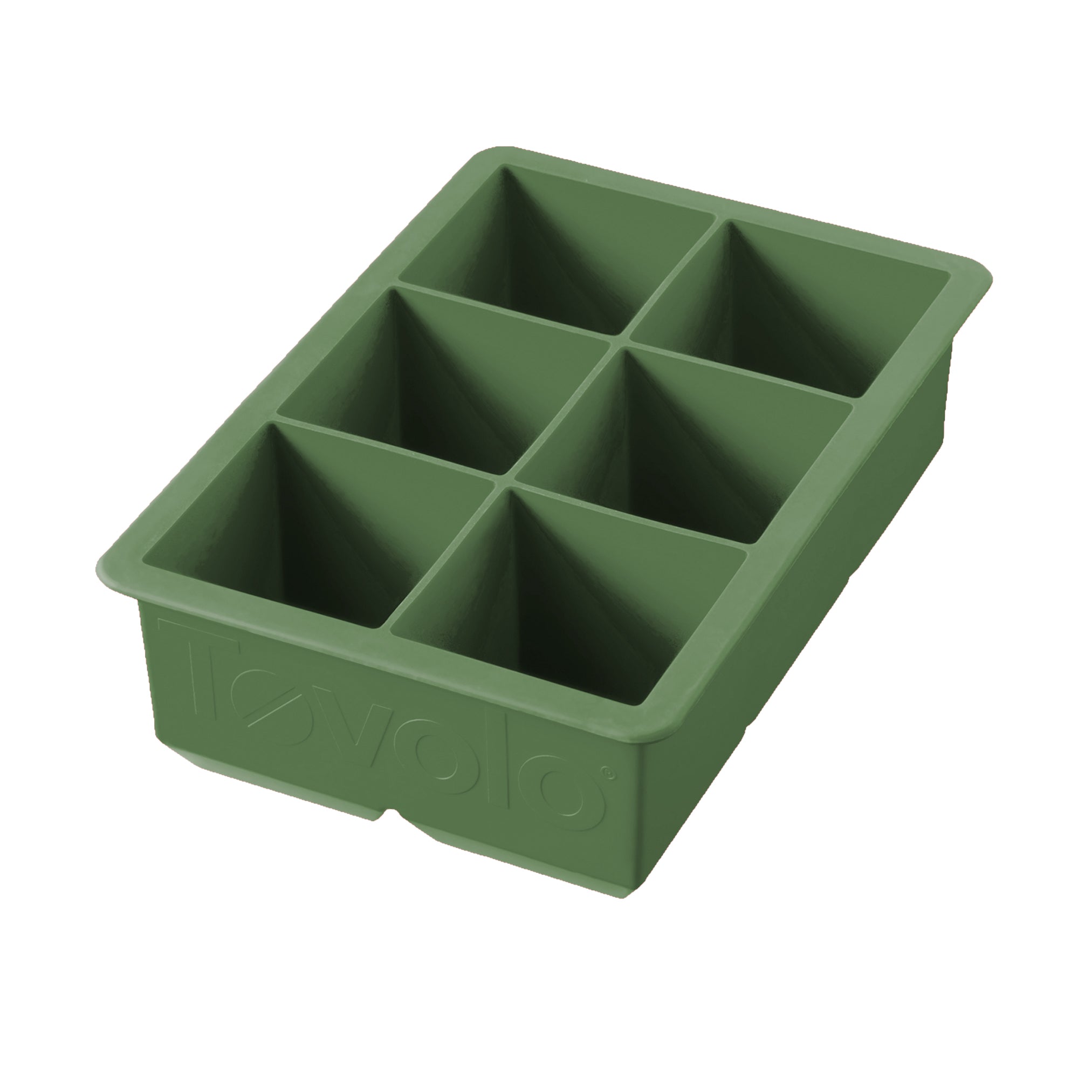 The tovolo King Cube Silicone Ice Mold is a green tray with six large square compartments, ideal for making big ice cubes. The brand name 'tovolo' is embossed on the side and visible from an angle.