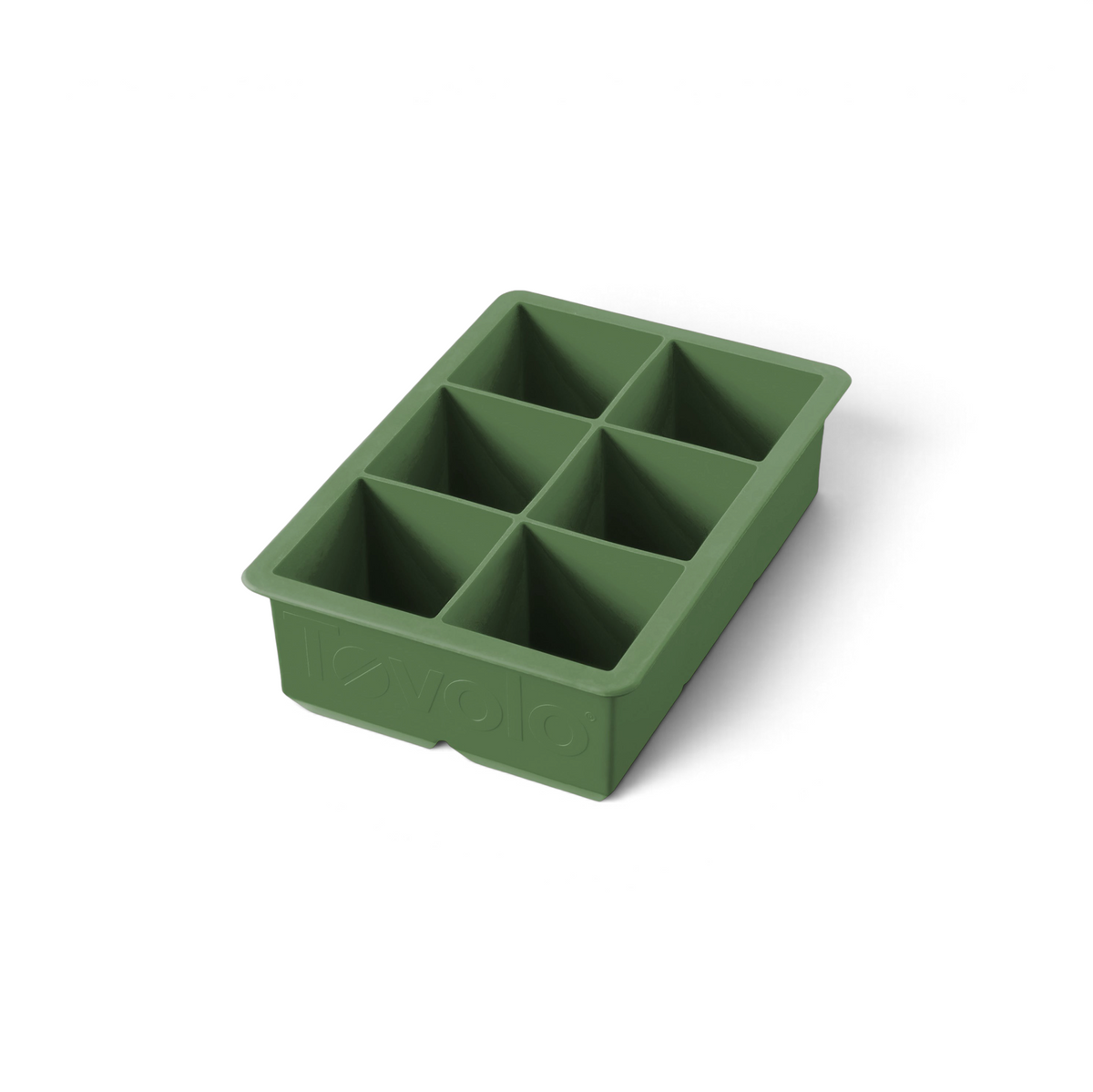 The tovolo King Cube Silicone Ice Mold is a green tray with six large square compartments, ideal for making big ice cubes. The brand name 'tovolo' is embossed on the side and visible from an angle.
