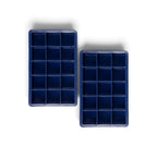 The tovolo Perfect Cube Silicone Ice Molds (Set of 2) are blue, rectangular trays made from food-grade silicone, ideal for crafting long-lasting ice cubes.