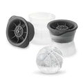 The tovolo Basketball Sports Ice Molds (Set of 2) feature clear and gray designs—one open, one closed—with a basketball ice sphere, perfect for creating fun craft ice shapes to keep drinks colder at your next game night.