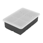 The Tovolo King Cube Ice Mold is a black silicone tray with a clear plastic lid, both branded with the Tovolo logo. Its rectangular design creates large square ice cubes.