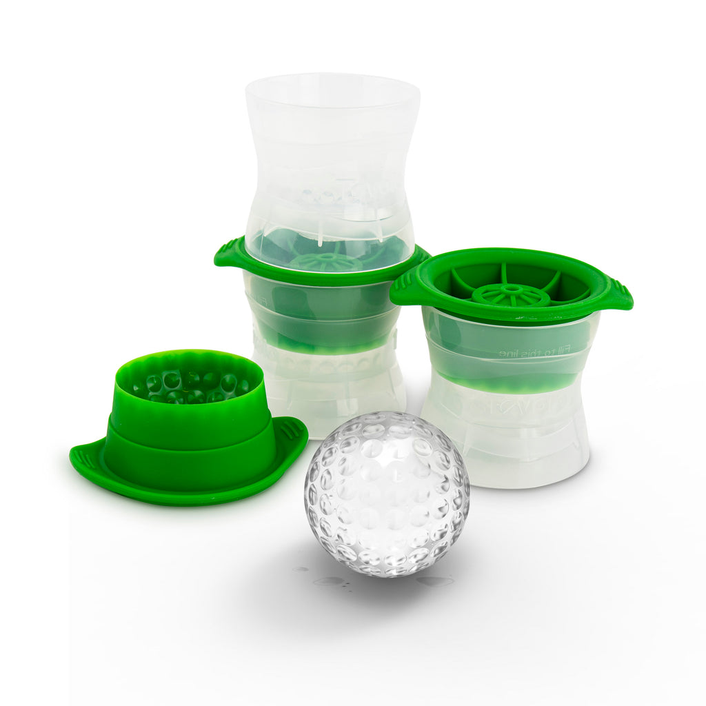 Three green and clear Sports Ice Molds are shown next to a round, dimpled ice ball shaped like a golf ball. These stackable, sports-themed molds create perfectly detailed golf ball-shaped ice.