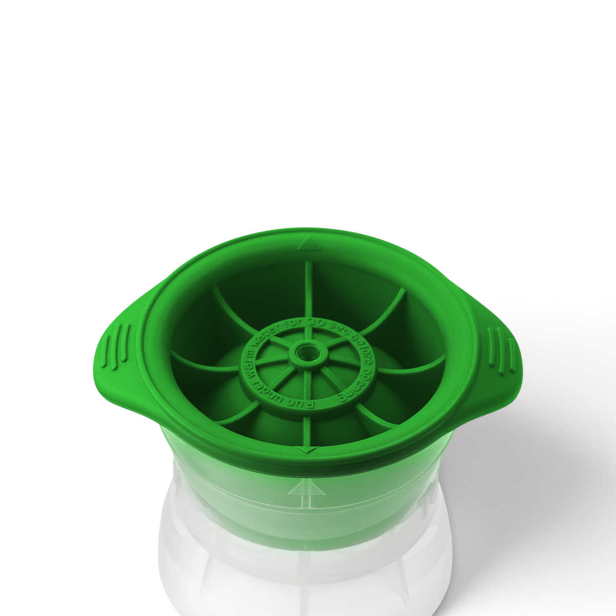 A green, round tovolo Baseball Ice Mold with side handles and a segmented wheel-like design sits atop a transparent container; comes as a set of 2.