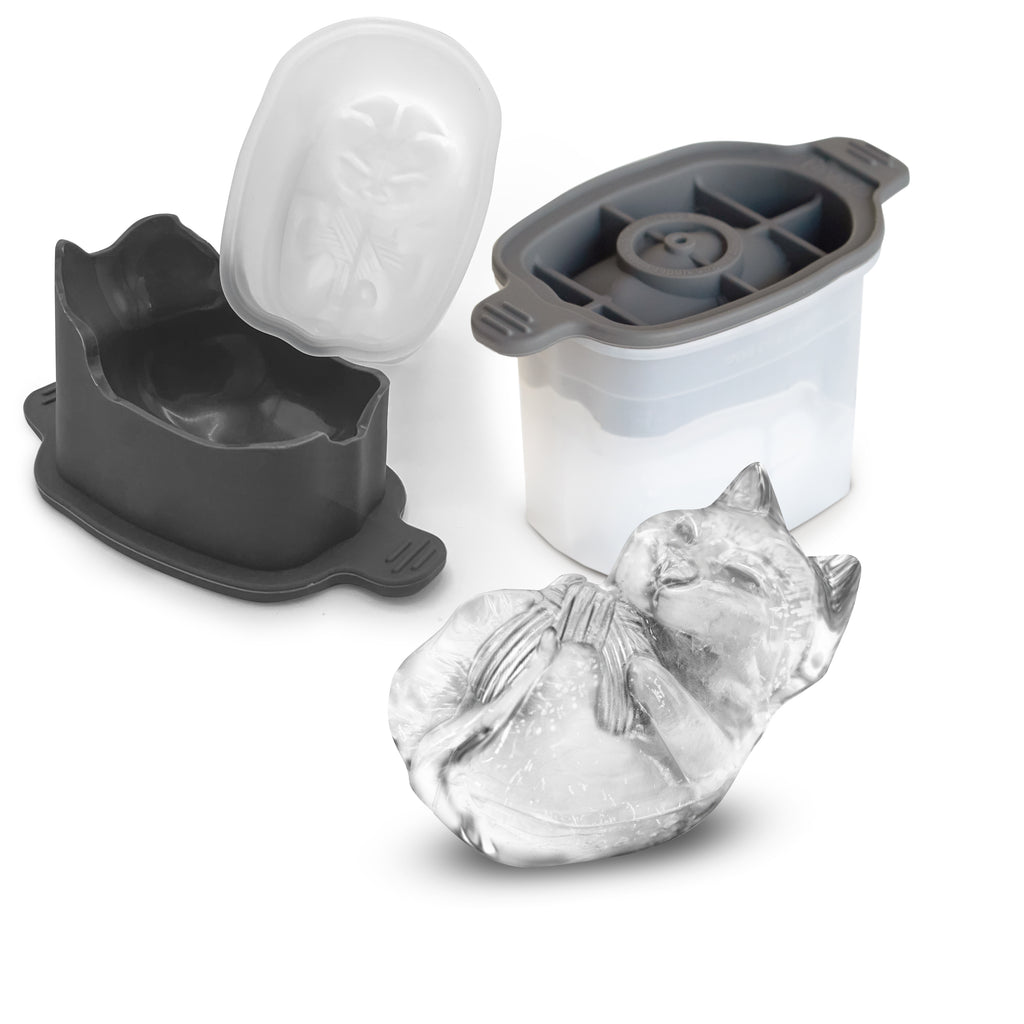 Pet Ice Molds features a three-part silicone design that creates a large, detailed ice cube shaped like a cat lying on its back with crossed paws. An example cat ice cube is displayed in front, perfect for craft ice enthusiasts.