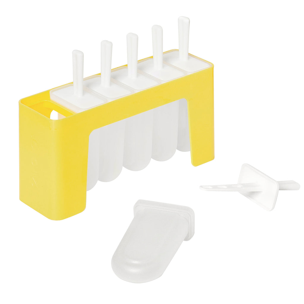 The Pop Molds w/ Tray is a yellow and white slimline popsicle mold with five slots—four filled with white sticks for homemade treats, one slot open. A popsicle stick and lid lie in front of the mold.