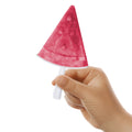A hand holds a watermelon-shaped popsicle with a white stick, made using Stackable Pop Molds, against a white background.