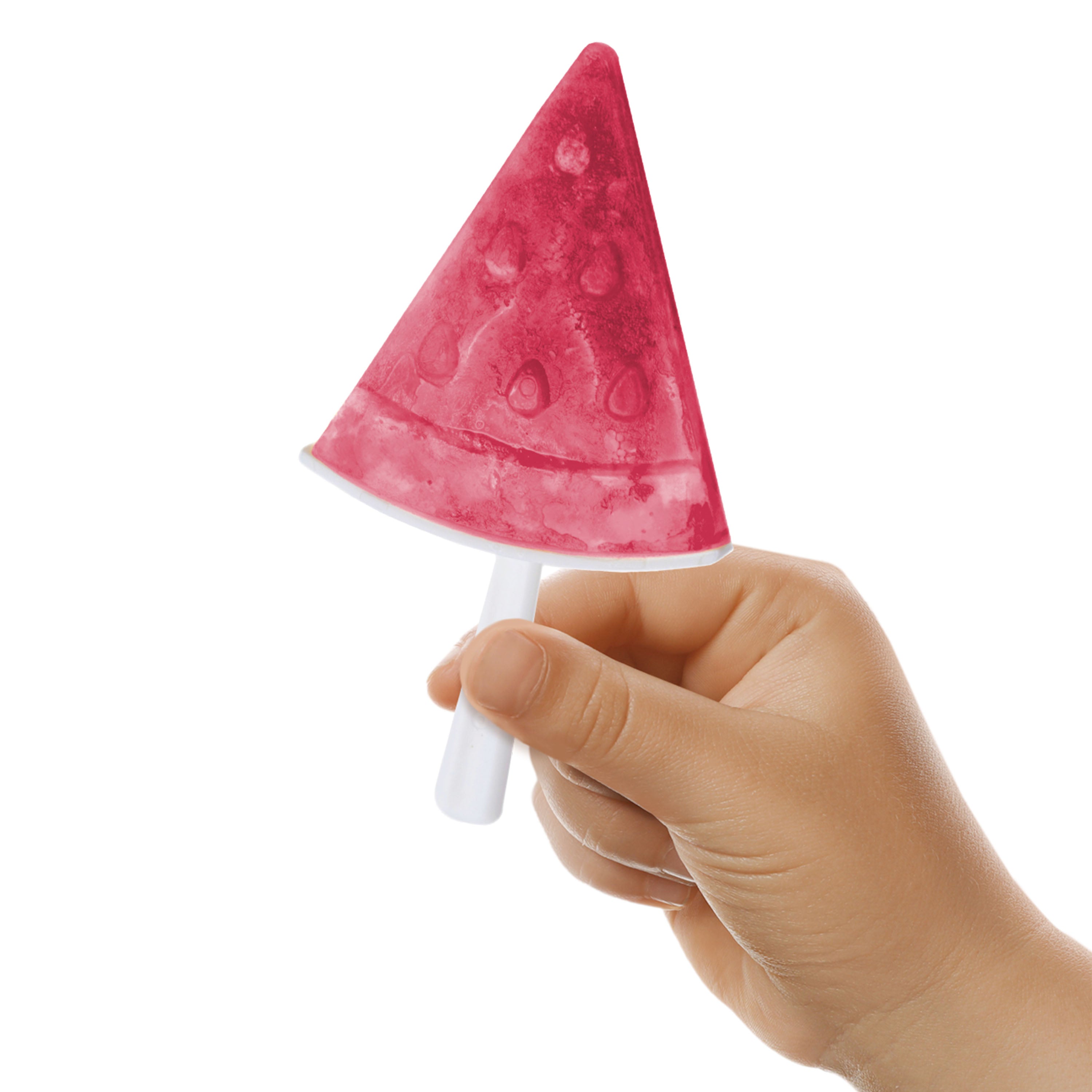 A hand holds a watermelon-shaped popsicle with a white stick, made using Stackable Pop Molds, against a white background.