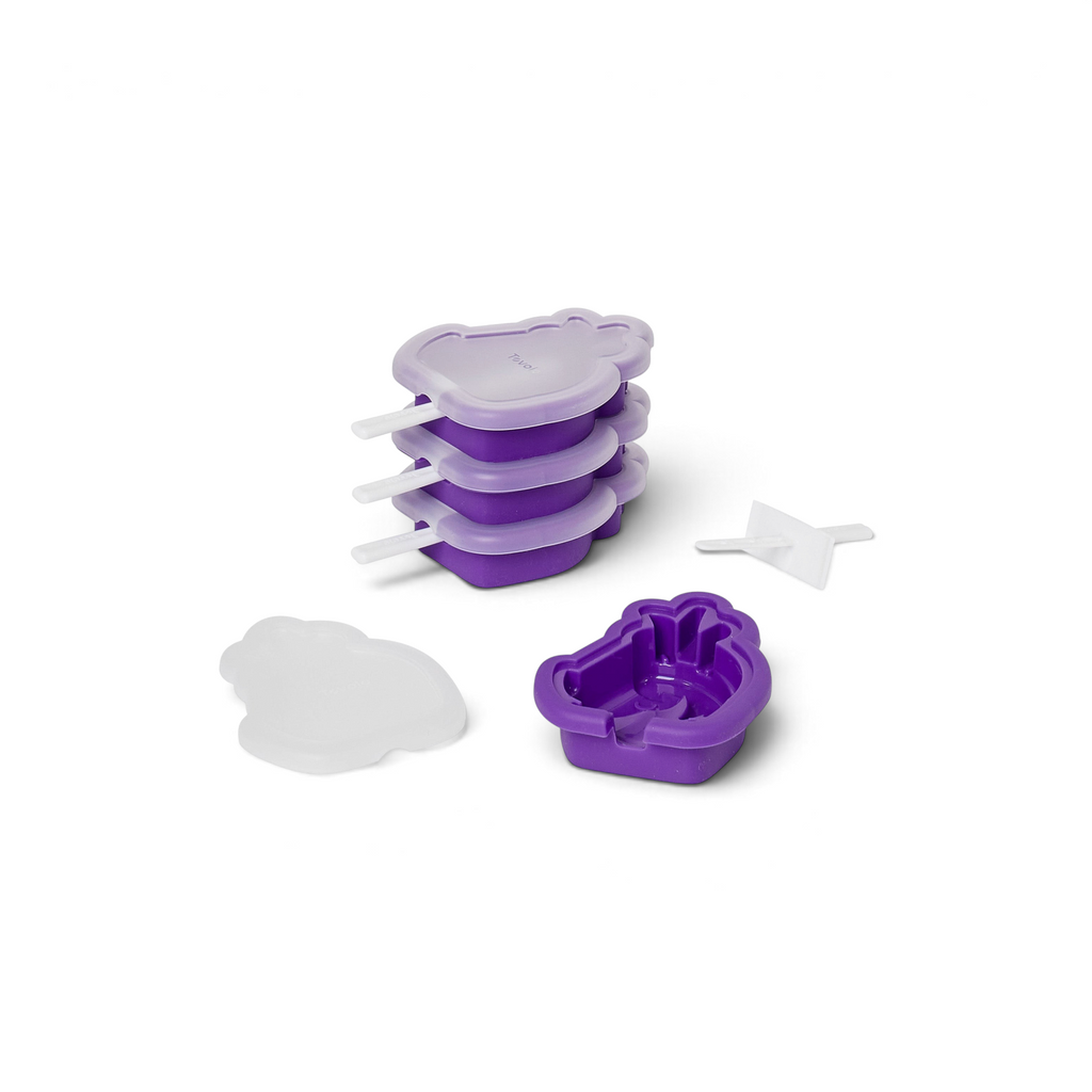 Four Stackable Pop Molds in purple with white handles and lids are shown; one is disassembled to display the handle, silicone base, and lid separately.