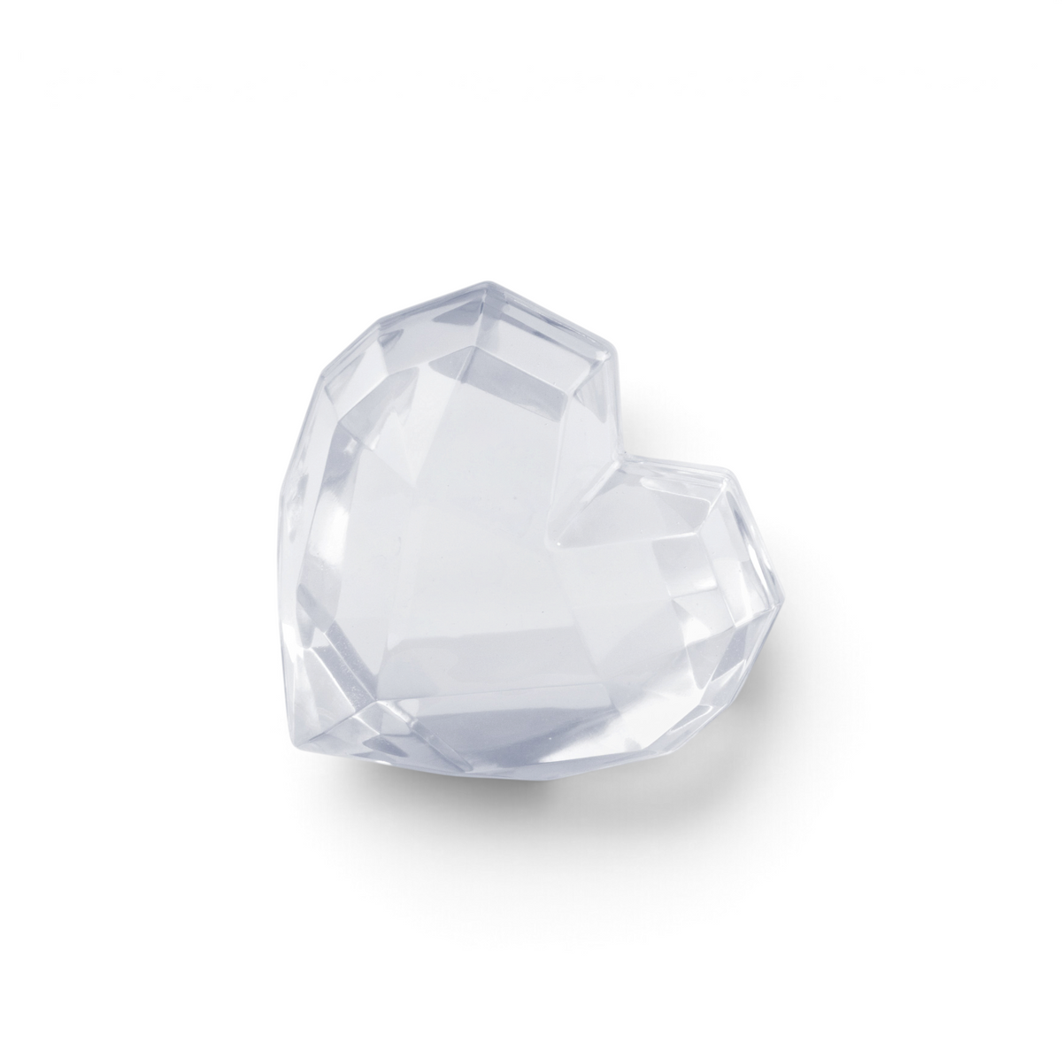 A clear, faceted crystal heart reminiscent of the elegance from tovolo Heart Ice Molds (Set of 2), set against a plain white background.