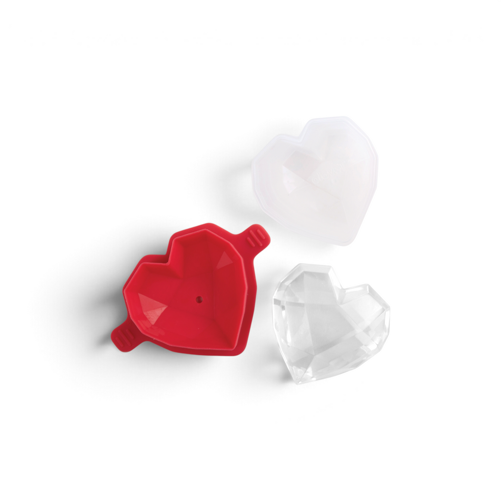 The tovolo Heart Ice Molds (Set of 2) feature red silicone molds with clear lids, ideal for crafting heart-shaped ice cubes or fun drink garnishes.