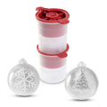 The tovolo Tree and Snowflake Ornament Ice Molds (Set of 2) create clear, slow-melting ice spheres—one with a snowflake, the other with a Christmas tree—perfect as a festive holiday gift.