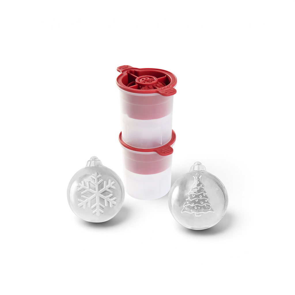 The tovolo Tree and Snowflake Ornament Ice Molds (Set of 2) create clear, slow-melting ice spheres—one with a snowflake, the other with a Christmas tree—perfect as a festive holiday gift.