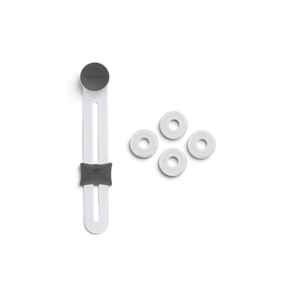 The Precision Pie Crust Cutter is a white adjustable baking tool with a gray Tovolo top and five removable discs—SCALLOPED, TIGHT WAVE, LOOSE WAVE, and STRAIGHT—for creating decorative dough edges.