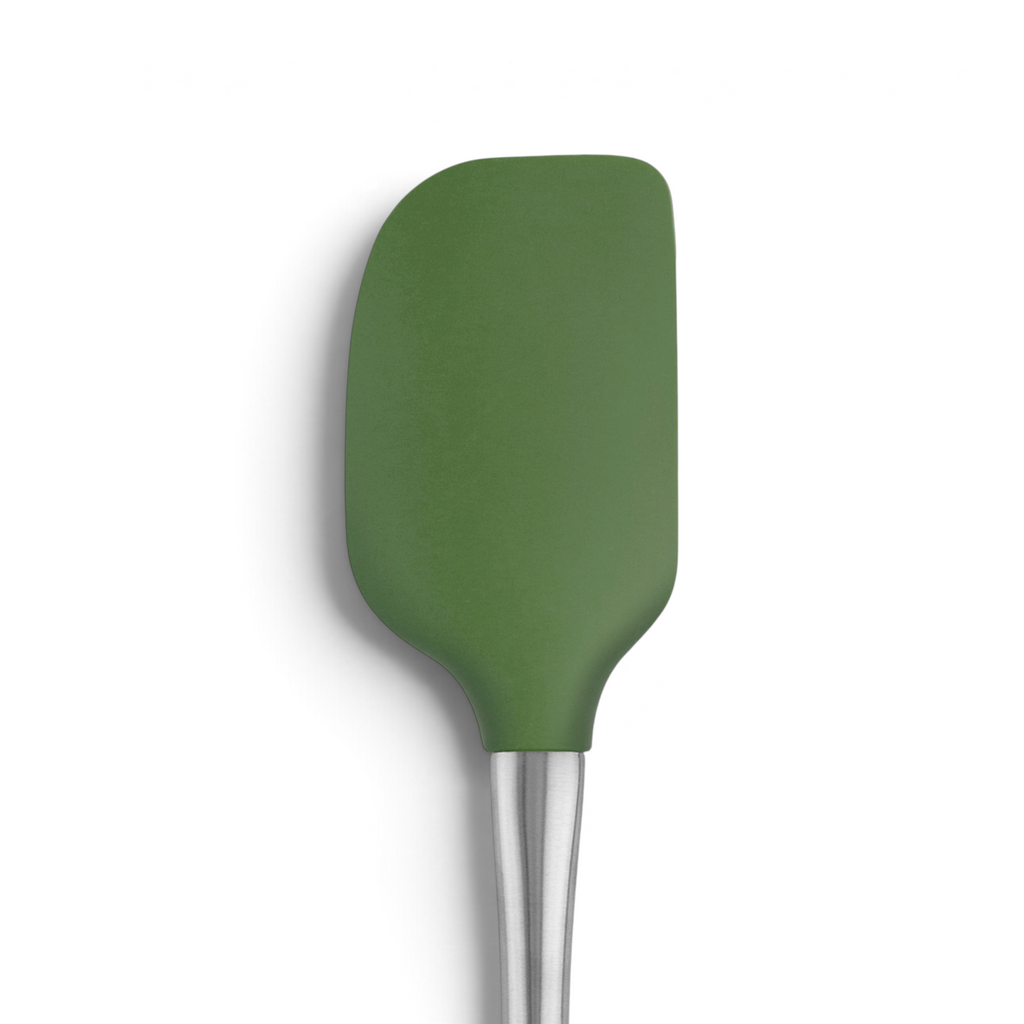 The Flex-Core Spatula features a green silicone rounded rectangular head and a stainless steel handle, designed for durability and shown against a white background.