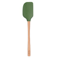 The Flex-Core Spatula features a green silicone head and a wooden handle engraved with "Tovolo," showcased on a white background.