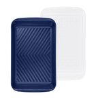 The Marinade Tray set includes two reusable rectangular trays: one solid navy with a chevron pattern, and one semi-transparent white with a circular textured design—ideal for marinating or grilling.