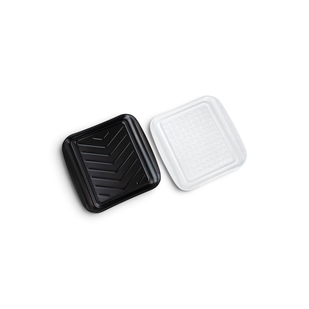The Prep and Serve BBQ Tray, featuring a black chevron-patterned square tray and a clear plastic lid with a textured grid design, is displayed on a white background—perfect for grill masters aiming to prevent contamination.