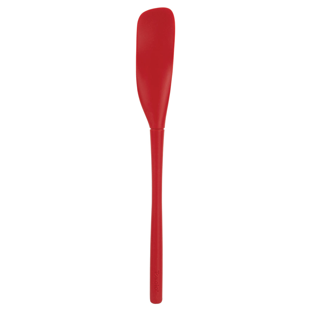 The Flex-Core Jar Scraper features a long, red silicone design with a narrow, curved blade and straight handle. Shown upright against a white background, it's ideal for scraping hard-to-reach spots in jars.