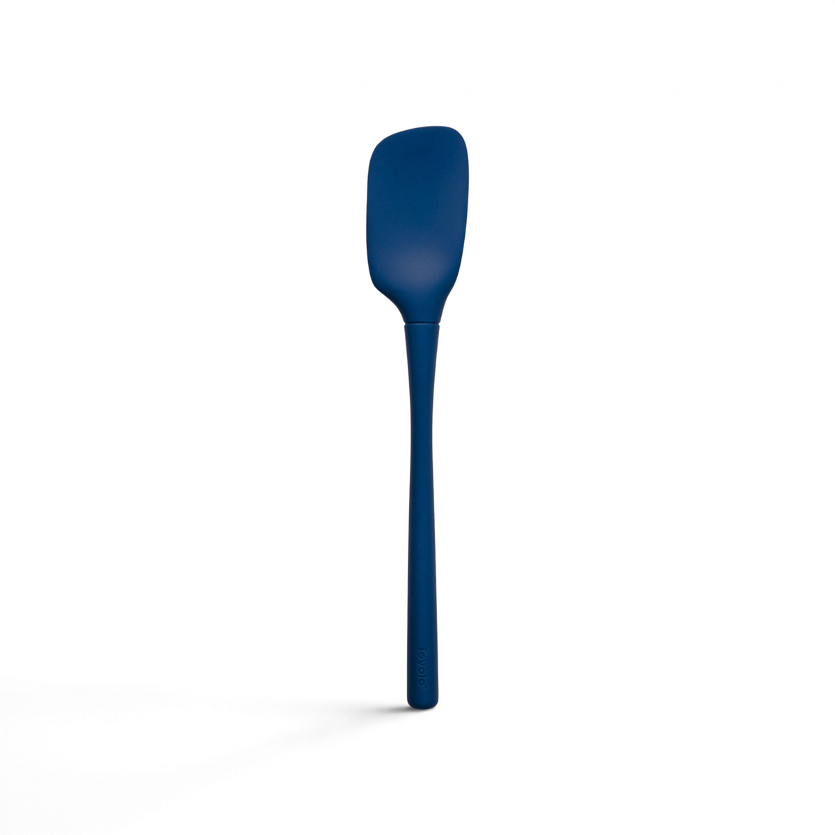 A dark blue tovolo Flex-Core Silicone Spoonula with a long handle and slightly rounded rectangular blade, pictured on a white background.