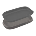 The Double Spoon Rest is a gray rectangular silicone tray with a fitted lid, shown slightly apart, featuring the Tovala brand on the side—perfect as a nesting spoon rest or kitchen utensil holder.