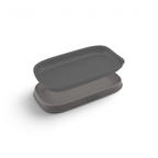 The Double Spoon Rest is a gray rectangular silicone tray with a fitted lid, shown slightly apart, featuring the Tovala brand on the side—perfect as a nesting spoon rest or kitchen utensil holder.