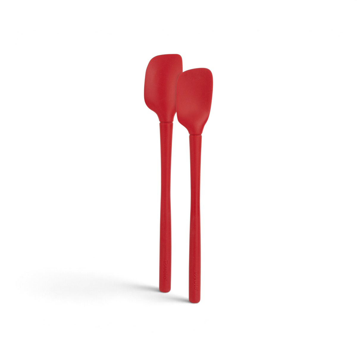 The tovolo Flex-Core Silicone Mini Spatula + Spoonula set features two red, heat-resistant utensils with long handles, positioned side by side against a white background.