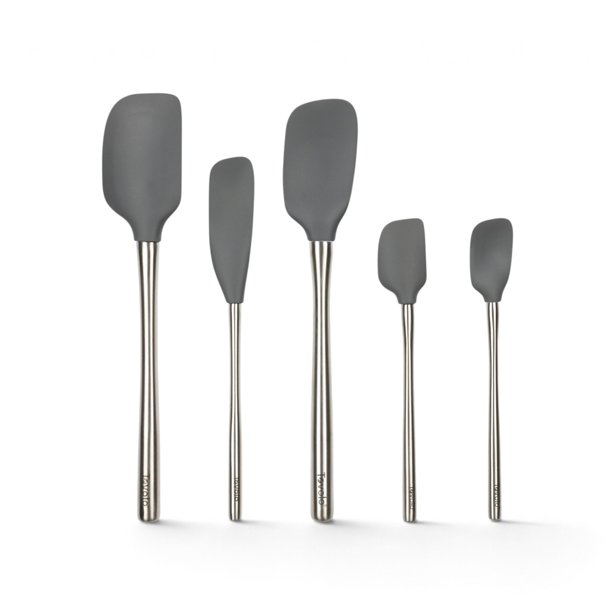 Five gray Flex-Core All-Silicone Spatulas are arranged upright in a row, sized large to small, against a white background—perfect as a versatile 5-piece spatula set for any kitchen.