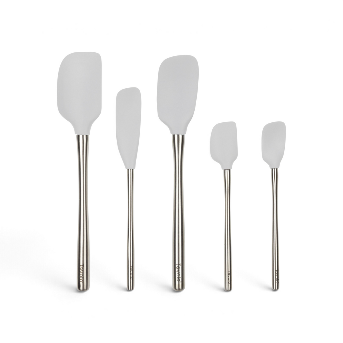 Five Flex-Core All-Silicone Spatulas are arranged in a row against a white background.