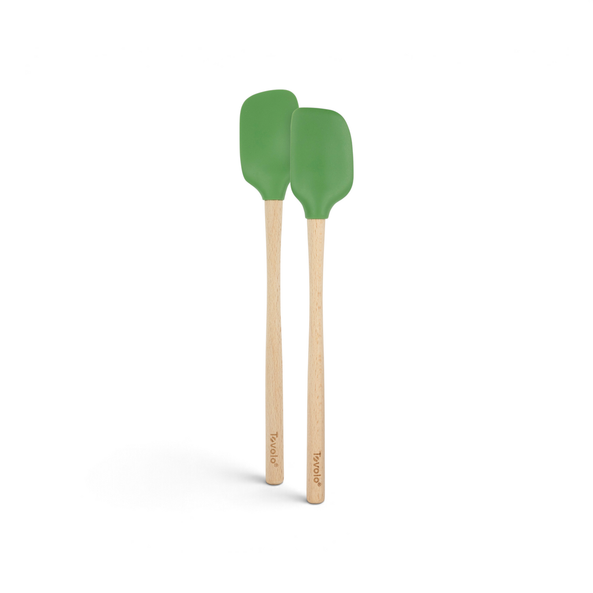 Two tovolo Flex-Core Silicone Mini Spatula + Spoonula utensils with green silicone heads and wooden handles stand side by side on a white background, highlighting their heat-resistant, versatile kitchen design.
