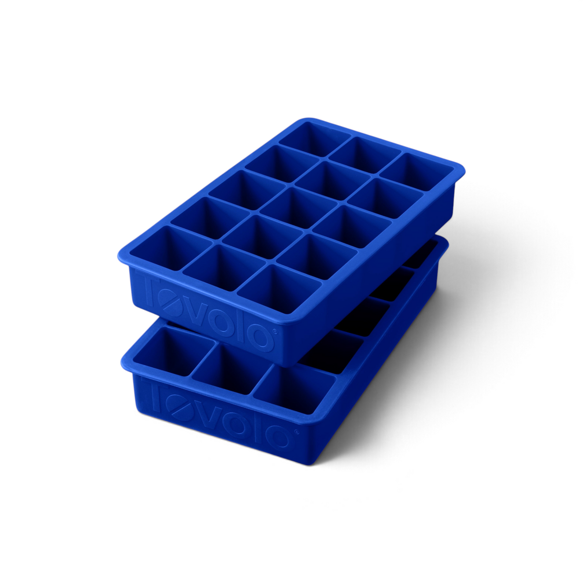 Two tovolo Perfect Cube Silicone Ice Molds in blue, each with fifteen large square compartments, are stacked on a white background.