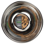 A top view of the durable tovolo Stainless Steel Mixing Bowl 7.5 QT, featuring a center label with the brand name and an image of cookie dough.