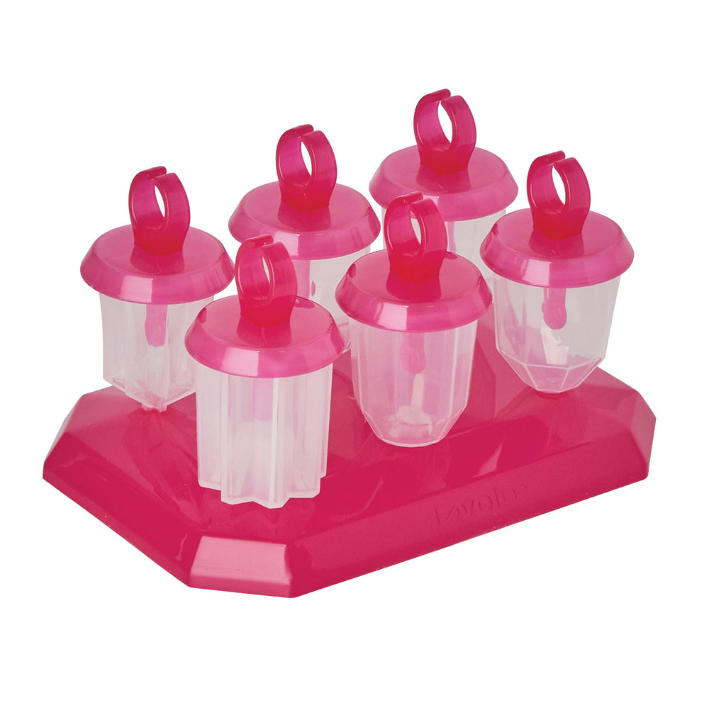 The Jewel Pop Molds set includes six pink and clear plastic popsicle molds with round handles, neatly arranged on a matching slim tray—ideal for creating homemade frozen treats.