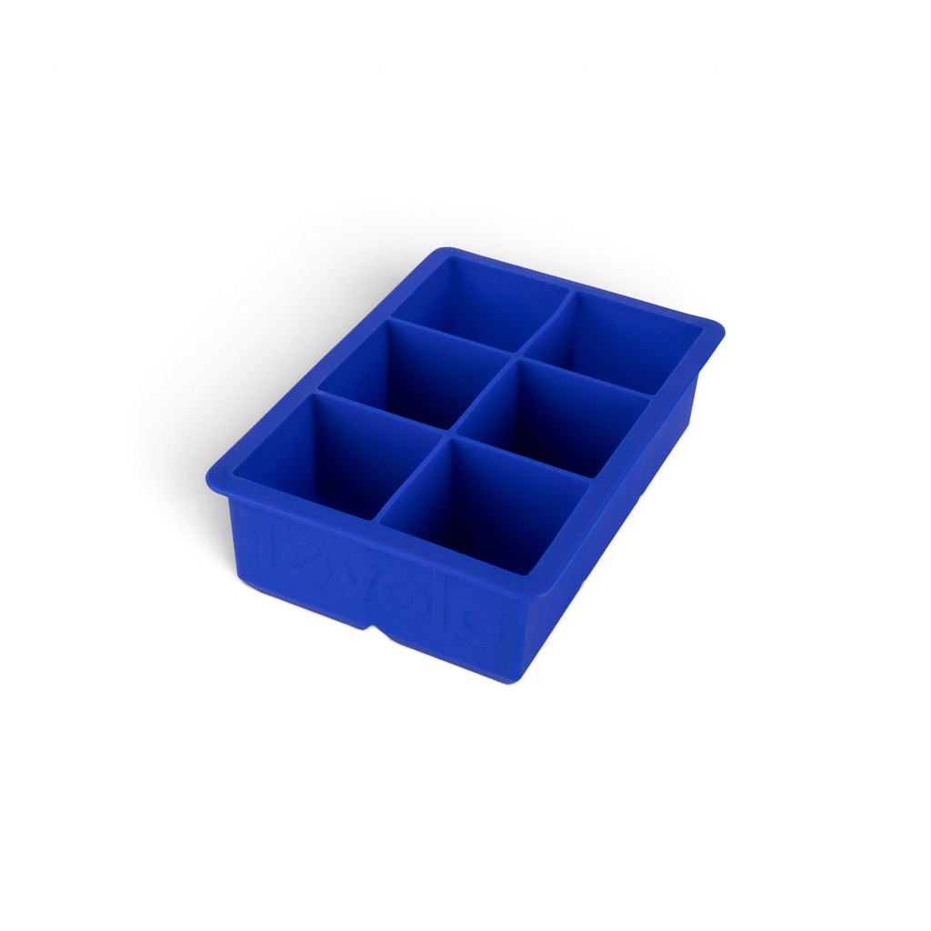 The tovolo King Cube Silicone Ice Mold features six large square compartments, making it perfect for crafting big ice cubes.